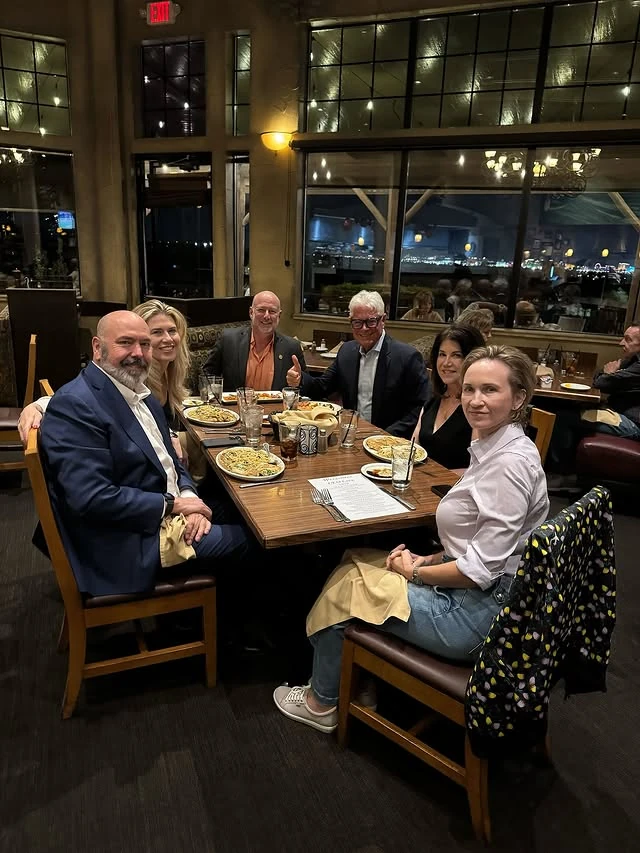 A chapter dinner with city views